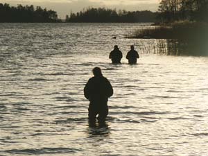 Fishermen waded out, try fishing on the Cape. Photo: Roland Strandell